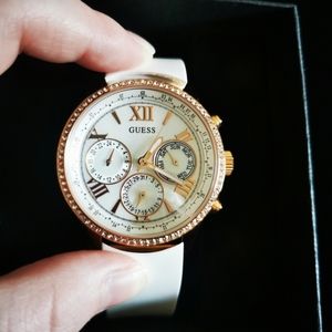 Rose gold Guess watch with white band